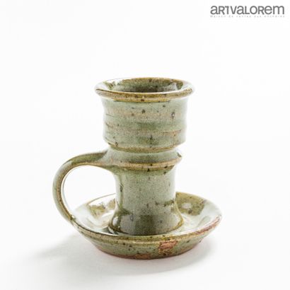  TIFFOCHE Gustave (1930-2011) 
Hand candlestick in celadon glazed stoneware. 
Signed....