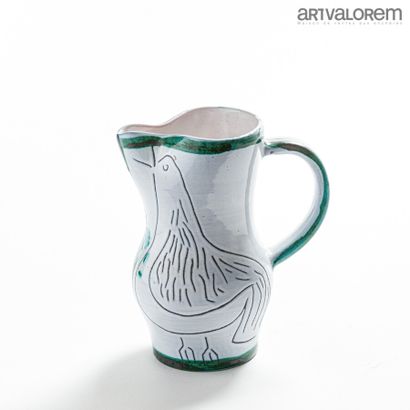 null JACQUES INNOCENTI (1926-1958) 

Pitcher with swollen body and detached handle...