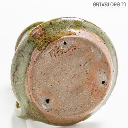 null TIFFOCHE Gustave (1930-2011)

Hand candlestick in celadon glazed stoneware....