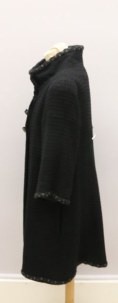 null CHANEL Collection Paris-Byzance

Veste longue en laine noire, doublure en soie...