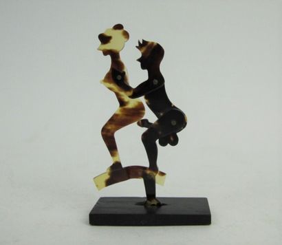 null Couple practicing a pleasure act in articulated bakelite.

About 1930.

H. 7,5...