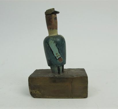 null Surprise figure in painted wood representing a businessman on a resin base enhanced...