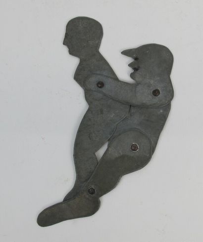 null Couple practicing an act of pleasure in articulated zinc.

About 1930.

H. 11,5...