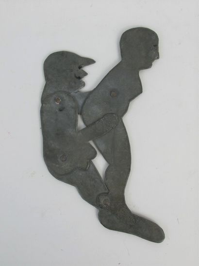null Couple practicing an act of pleasure in articulated zinc.

About 1930.

H. 11,5...