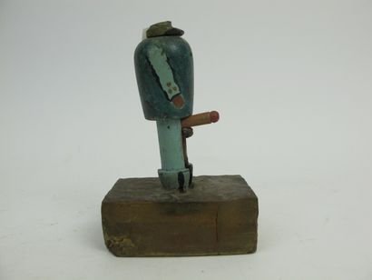 null Surprise figure in painted wood representing a businessman on a resin base enhanced...