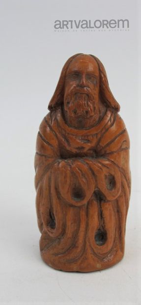 null Carved boxwood prankster monk representing a phallus from behind.

Folk art...