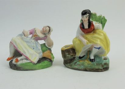 null Porcelain inkwell with polychrome decoration of a woman raising her skirt.

H....