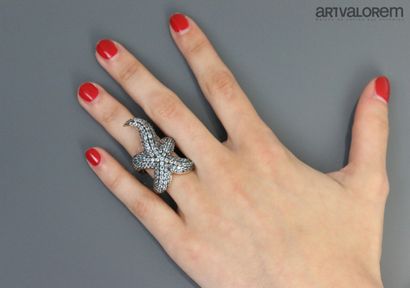 null Silver Starfish Ring 925 °/°° with Sapphires 

TDD: 55

Gross weight: 14,2 ...