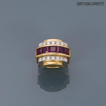 null Yellow and white gold Chevalière 750°/°° centered with five violet stones in...