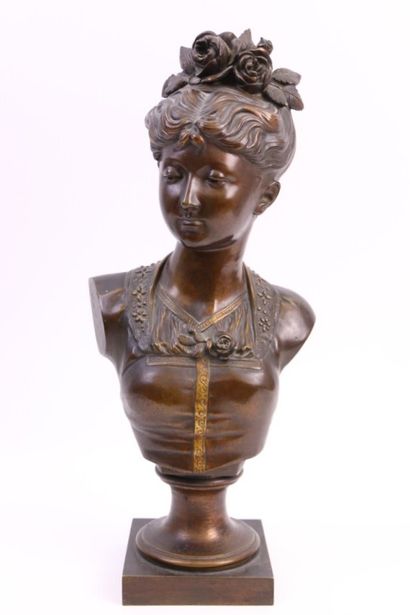 null Bust of a young woman wearing roses in bronze with brown patina. French work...