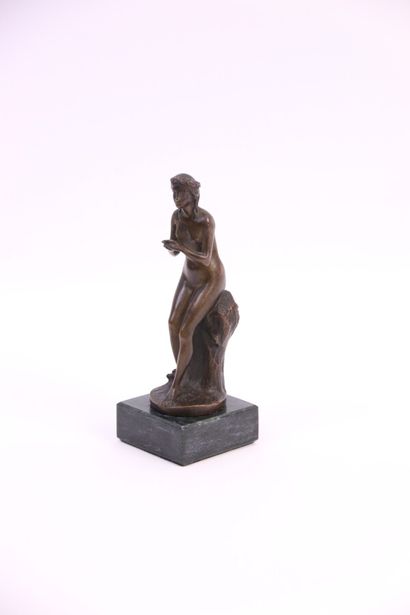 null Naiad on her rock. Bronze with brown patina on a marble base. Foundry Susse...