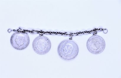 null Silver bracelet 800°/°° with jaseron links, decorated with 4 mexican silver...