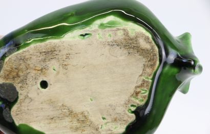 null Pol CHAMBOST, in the taste of

Green glazed terracotta pocket in the shape of...