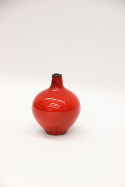 null René MAUREL (1910-1986)

Vase with globular body and small neck in red glazed...