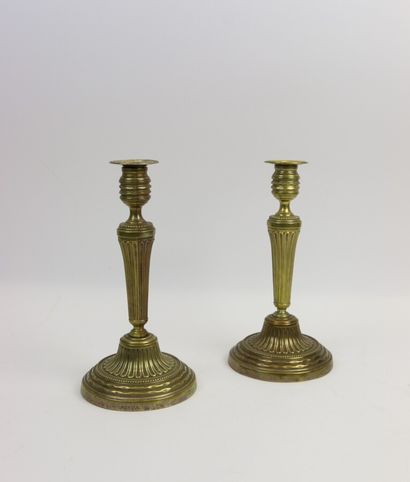 null Pair of chased brass torches