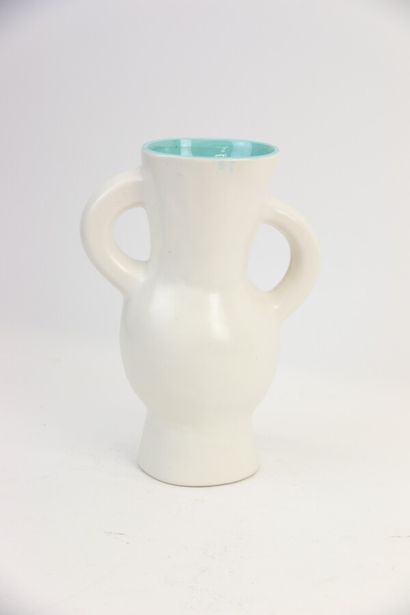 null A white glazed stoneware vase with two asymmetrical handles and turquoise glazed...