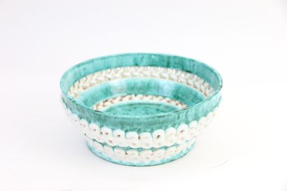 null SAINT RADEGONDE

A turquoise and speckled glazed earthenware bowl with openwork...