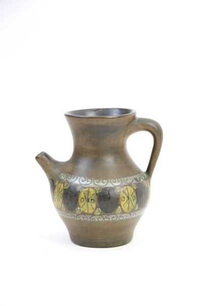 null Jean de LESPINASSE (1896-1979)

Brown enamelled stoneware pitcher decorated...
