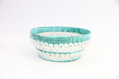 null SAINT RADEGONDE

A turquoise and speckled glazed earthenware bowl with openwork...