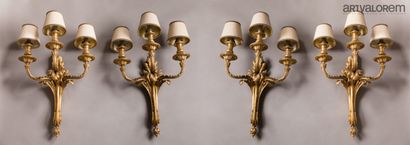 null Two pairs of ormolu and chased sconces with three arms of lights with acanthus...