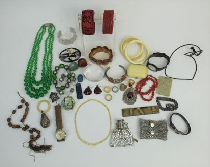 null 
Set of fancy jewels: Kelton watch, glass beads necklaces, ivory purse, cuff...