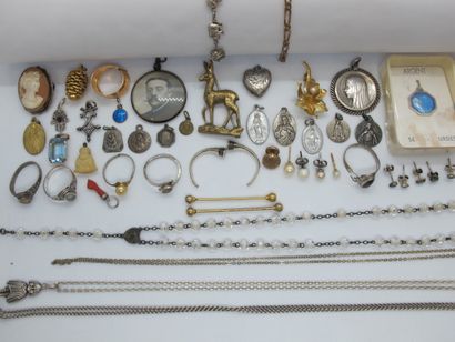 null Rings, rosary, medals, cameo, deer brooch, earrings.