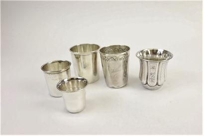 null Set of five silver kettledrums with various decorations: plain, frieze of stylized...