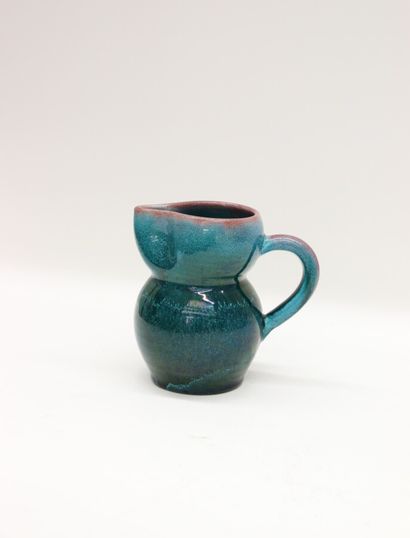 null ACCOLAY. Stoneware pitcher with pinched neck, flamed turquoise and burgundy

Signed...