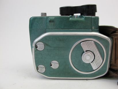 null LORDOMAT;

Silver camera, lens 1:2.8/50

Two cameras are attached: Bauer 88b...