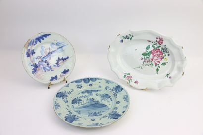 null Lot of three earthenware dishes including :

- EAST OF FRANCE, Oval dish with...