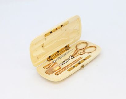 null Ivory sewing set engraved with the monogram AC on the lid including: a thimble,...