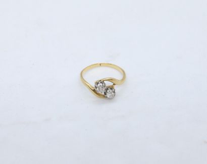 null Ring Toi et Moi in yellow and white gold 750°/°°° set with two diamonds of about...