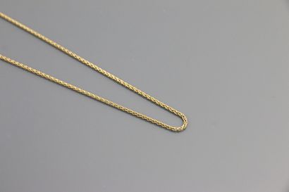 null Chain in yellow gold 750°/°° with palm tree link, clasp with snap hook.

Length:...