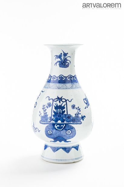 null CHINA, 19th century, in the style of the 17th century.

A white-blue enamelled...