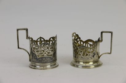 null Two silver cup mounts with one handle, 875°/°°° nielloed with openwork scrolls.

Russian...