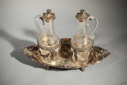 null A 925°/°° silver oil and vinegar cruet decorated with bunches of grapes, ribboned...