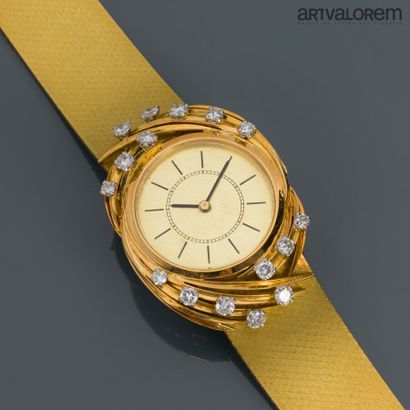 null Montre bracelet de dame en or jaune 750°/°° et platine 800°/°° , la lunette...