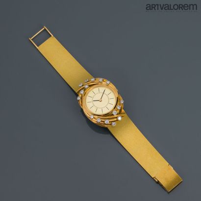 null Montre bracelet de dame en or jaune 750°/°° et platine 800°/°° , la lunette...