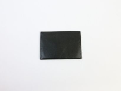 null CARTIER Paris

Porte carte en cuir noir. 

6,5 x 9,5 cm

(Bon état)
