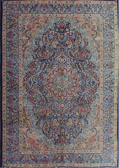 null Large and late Kirman (Iran) circa 1975.

 Midnight blue field decorated with...