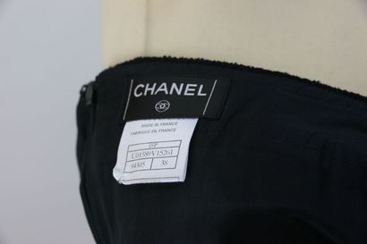 null CHANEL Boutique 

Straight skirt in black wool blend, with a zip fastening in...