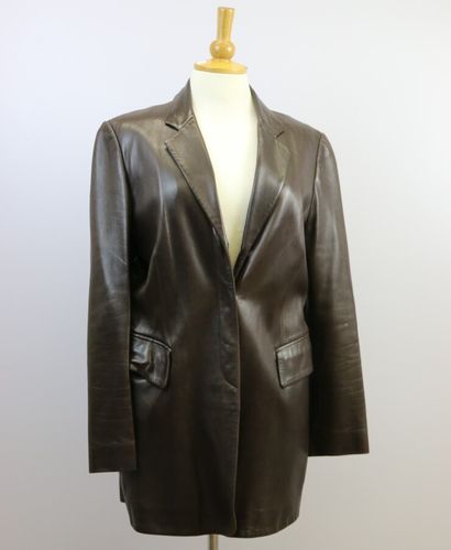 null BARBARA BUI 

Brown leather long jacket with three magnetic buttons and two...