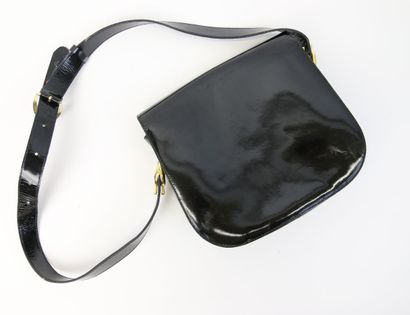 null CELINE 

Black patent leather bag with adjustable shoulder strap, opening with...