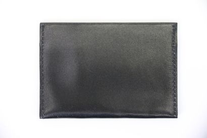 null CARTIER Paris

Black leather card case. 

6,5 x 9,5 cm

(Good condition)