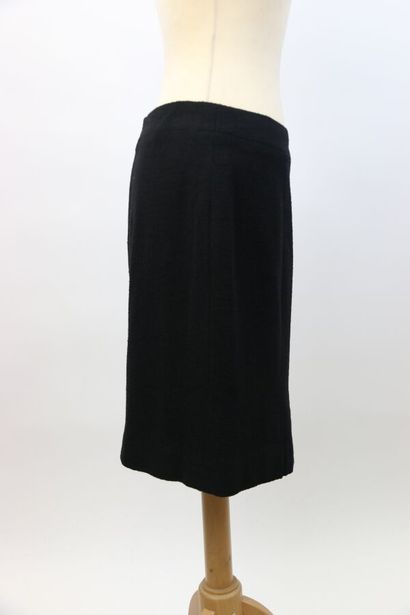 null CHANEL Boutique 

Straight skirt in black wool blend, with a zip fastening in...