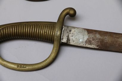 null Pair of "lighter" swords, slightly curved blade, one marked "M & R. BOKER in...