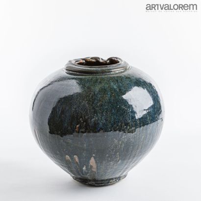 null LANOS Michel (1926-2005)

Important ovoid vase on heel with hemmed and moved...