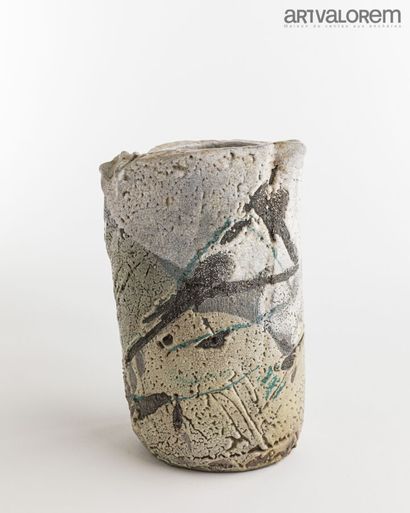 null HAGUIKO (born 1948)

Large truncated cone-shaped vase in raku stoneware partially...