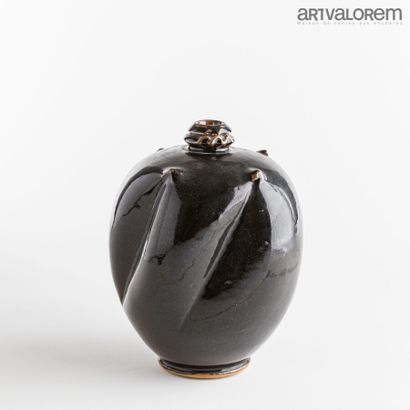 null LANOS Michel (1926-2005) 

Vase of ovoid form twisted, the neck with double...
