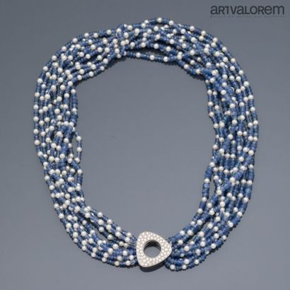 null ANTONINI

Necklace composed of ten rows of cultured pearls and faceted sapphire...